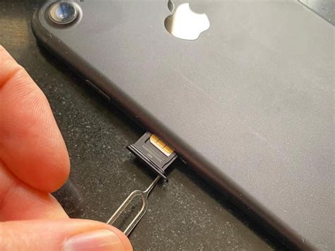 Opening The SIM Card Slot On IPhone: .
